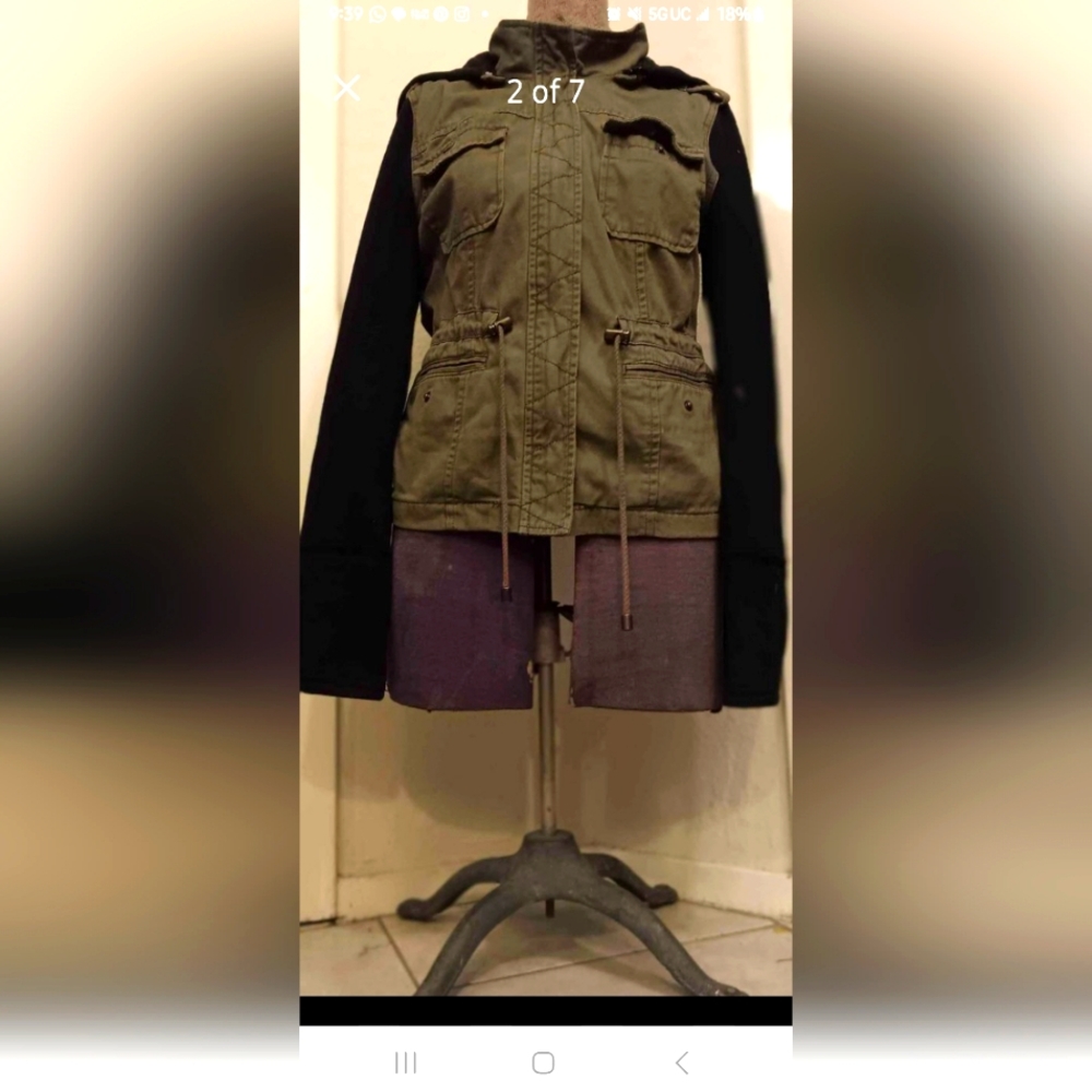 Army green canvas vested jacket with Black sleeves lining and hood. Size S